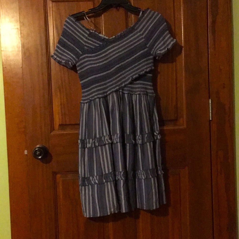 An off the shoulder or on the shoulder dress for a Casual event
